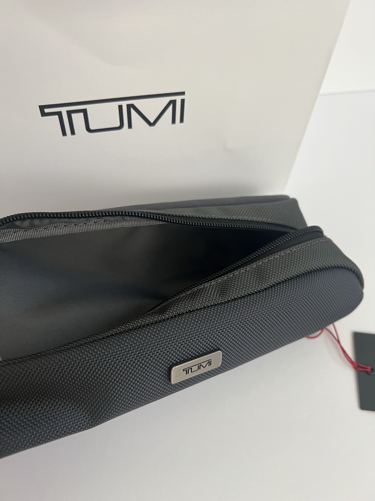 Tumi Seal Grey Travel Accessory Zipper Small Cord Pouch Bag