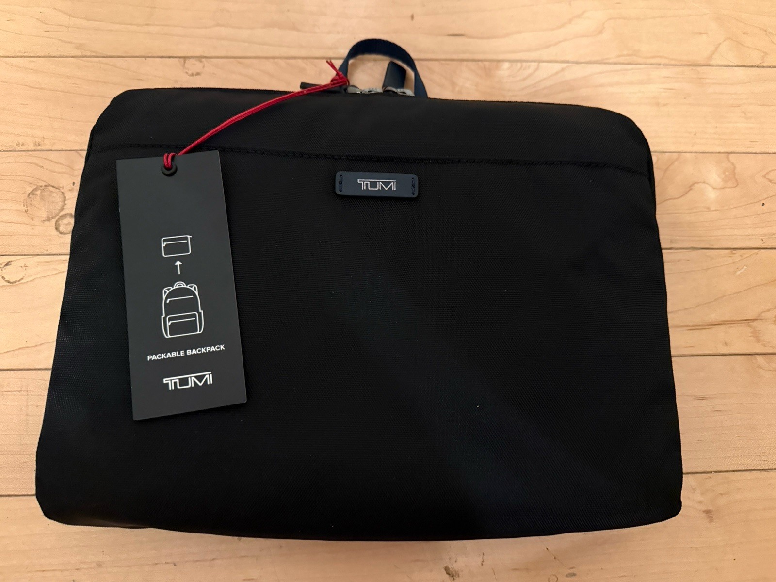 NEW TUMI Voyageur JUST IN CASE Packable 17.0” Backpack – BLACK w/ NAVY accents