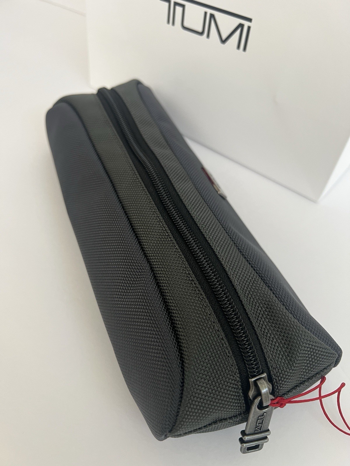 Tumi Seal Grey Travel Accessory Zipper Small Cord Pouch Bag